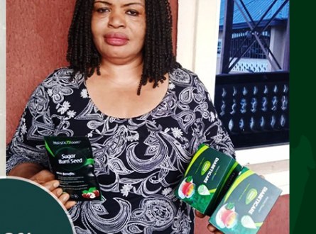 Verified Diabeticare customer showing her pack at home